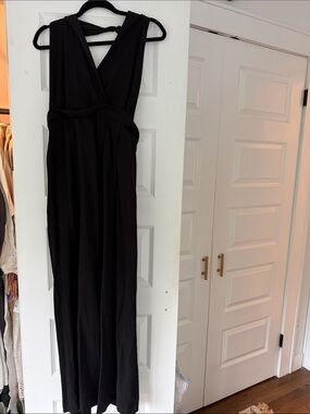 Zara Black halter one piece with open back and tie bow.